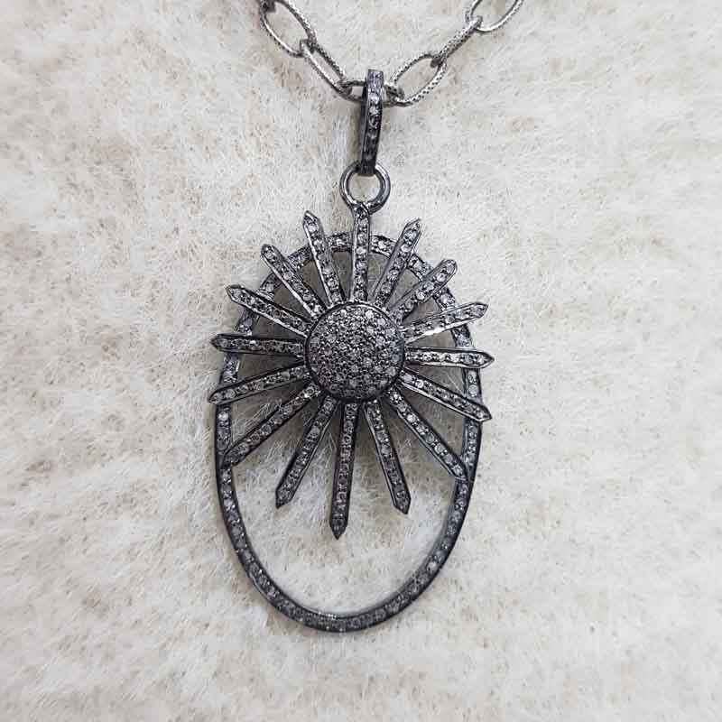 Oval shaped Sunburst style Pave diamond pendent