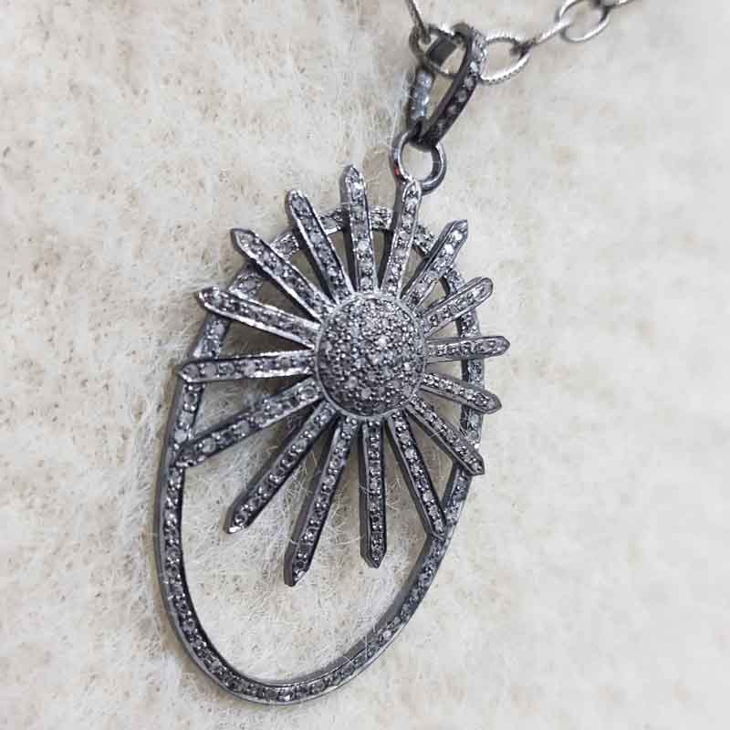 Oval shaped Sunburst style Pave diamond pendent