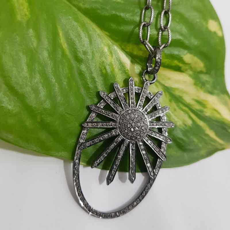 Oval shaped Sunburst style Pave diamond pendent