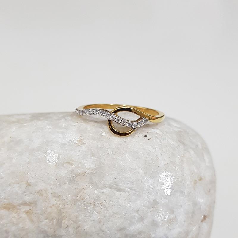 14 KT. DIAMOND CURVED RING