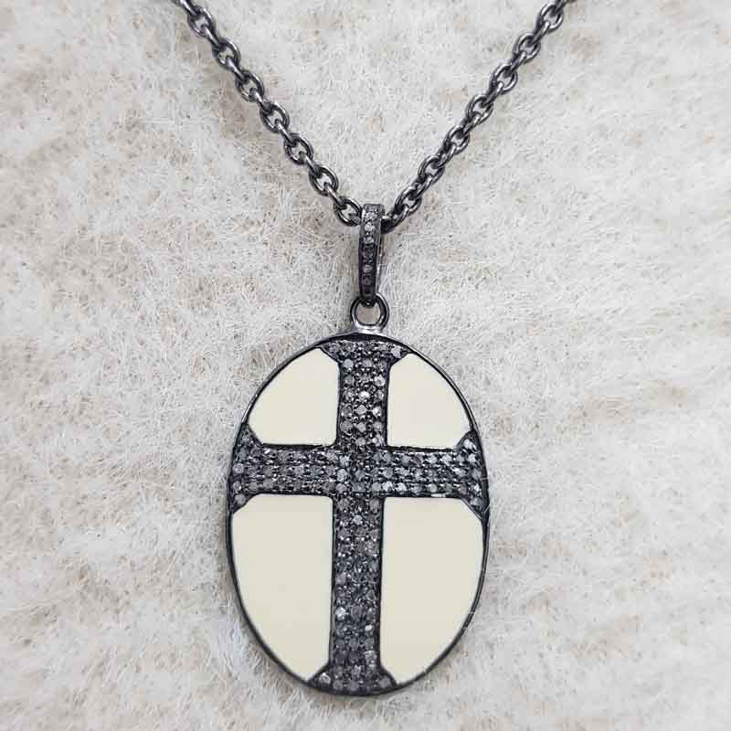 Oval Shaped Pave Diamond Cross Style Pendent With Cream Enamel