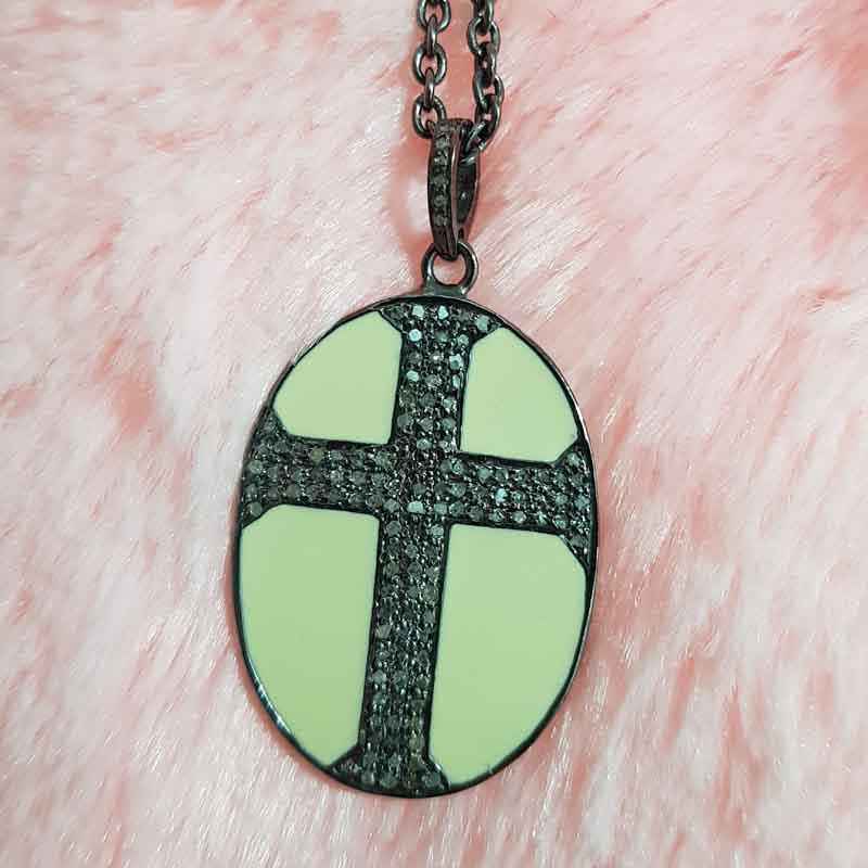 Oval Shaped Pave Diamond Cross Style Pendent With Cream Enamel