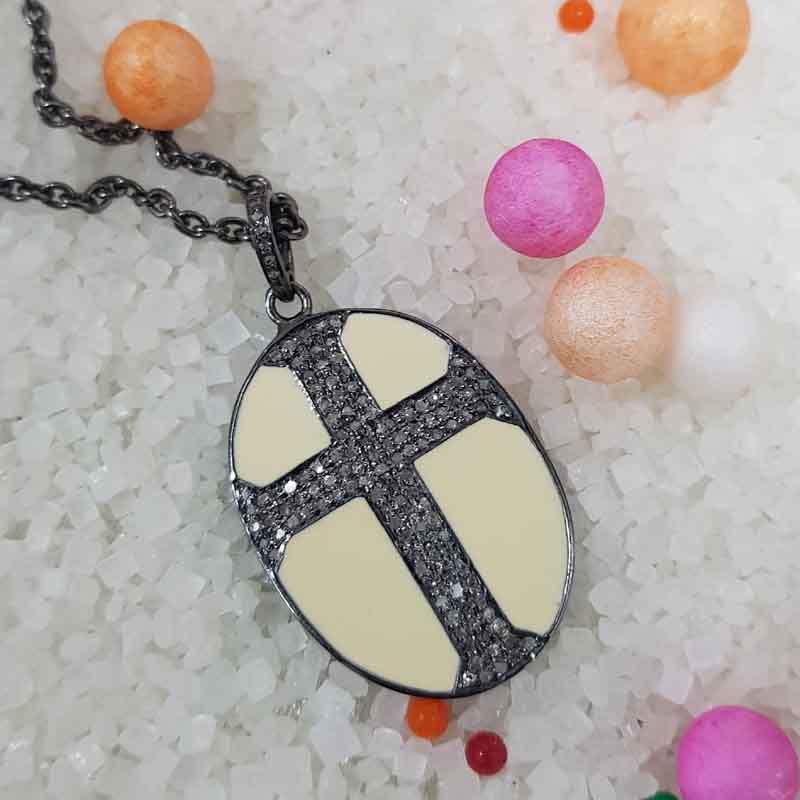 Oval Shaped Pave Diamond Cross Style Pendent With Cream Enamel