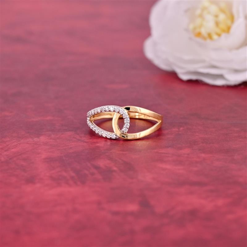 14 KT. DIAMOND GOLD KNOT RING