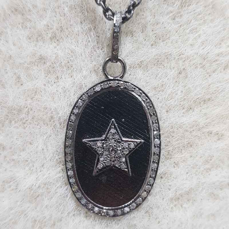 Oval Shaped Pave Diamond With Star Pendent