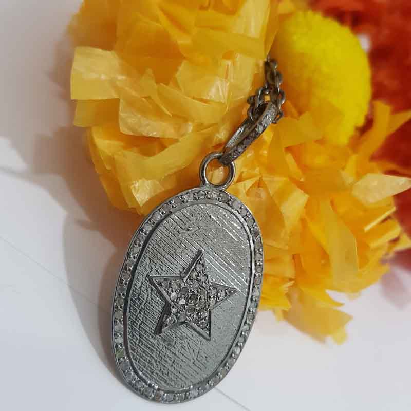 Oval Shaped Pave Diamond With Star Pendent