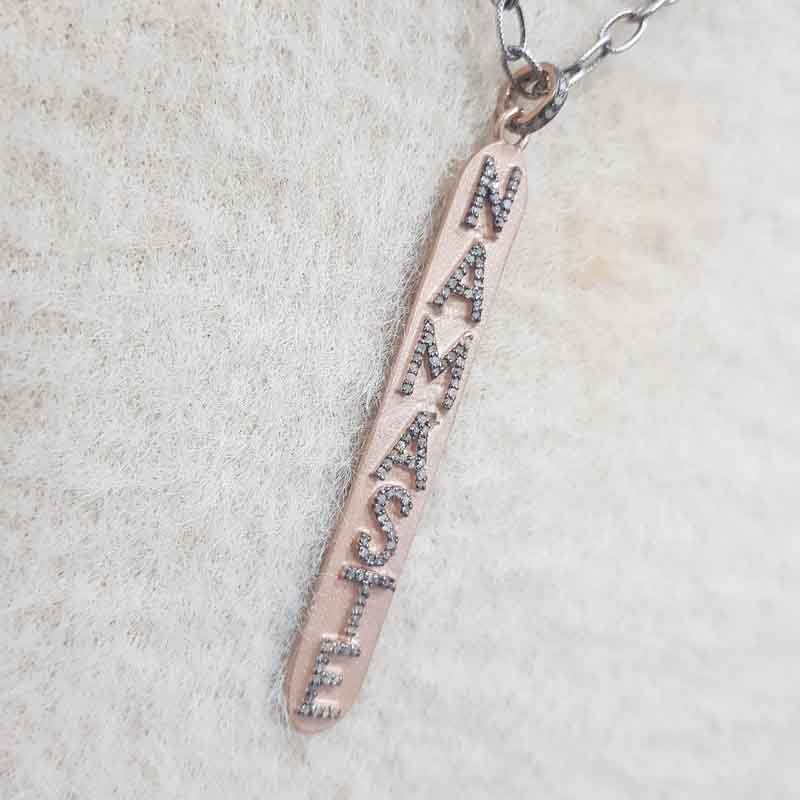 Namaste Designer Latter Pendent With Rose Gold Rhodium Plate