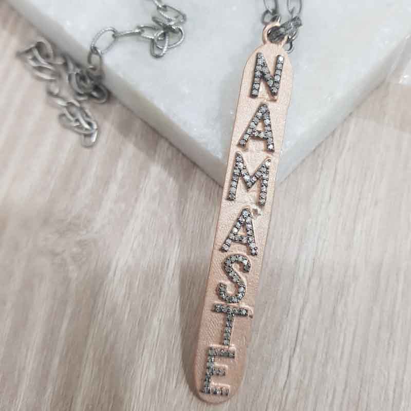 Namaste Designer Latter Pendent With Rose Gold Rhodium Plate