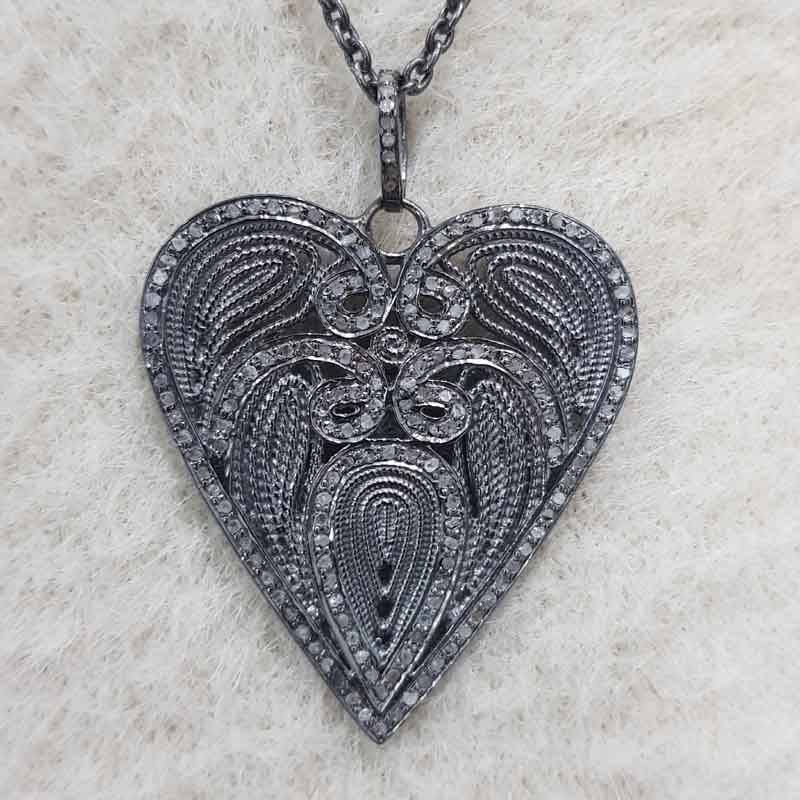 Good Looking Heart Pendent With Pave Diamond Layers