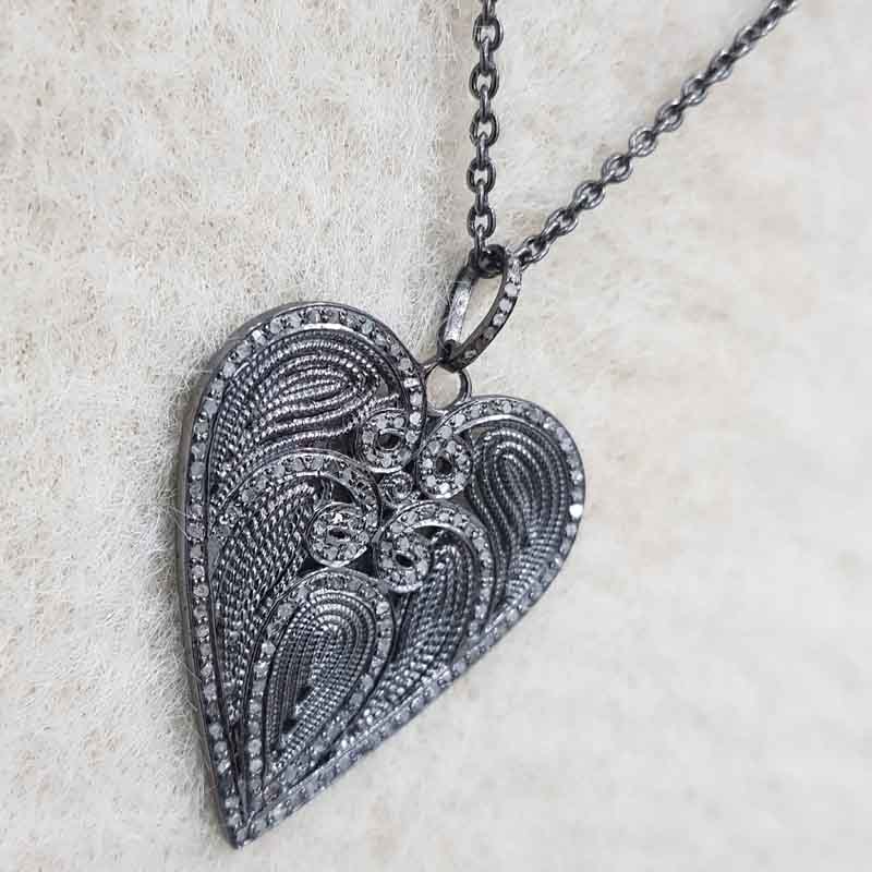 Good Looking Heart Pendent With Pave Diamond Layers