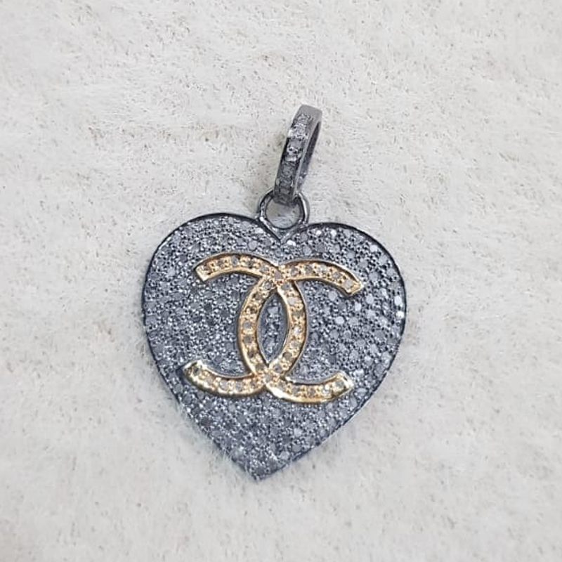 Beautiful Two Tone Heart Pendant With CC Twist