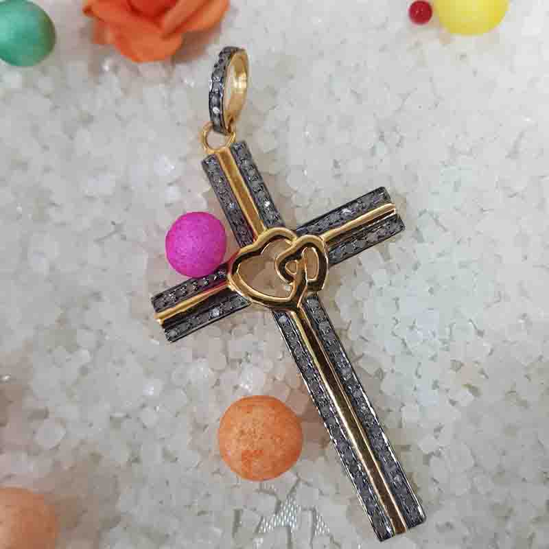 Beautifully Designed Cross Pendent With Little Joined Heart In Center