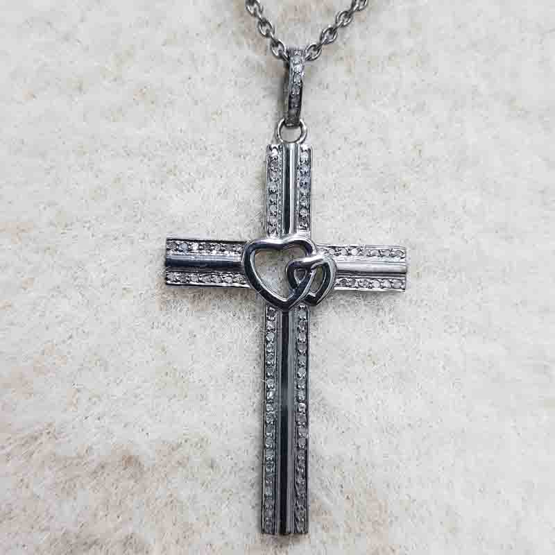 Beautifully Designed Cross Pendent With Little Joined Heart In Center