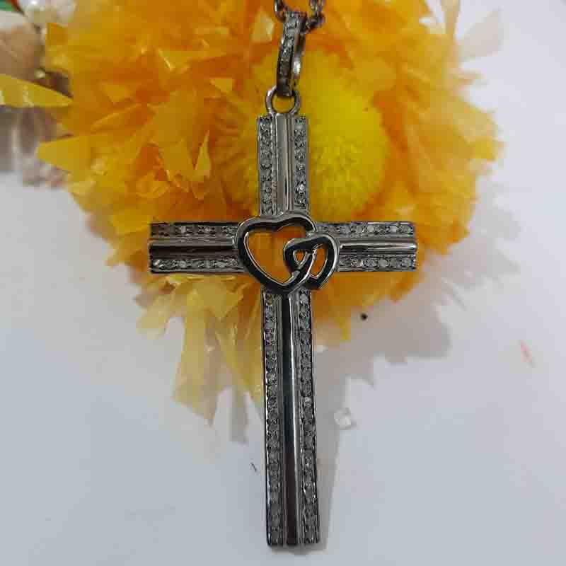 Beautifully Designed Cross Pendent With Little Joined Heart In Center